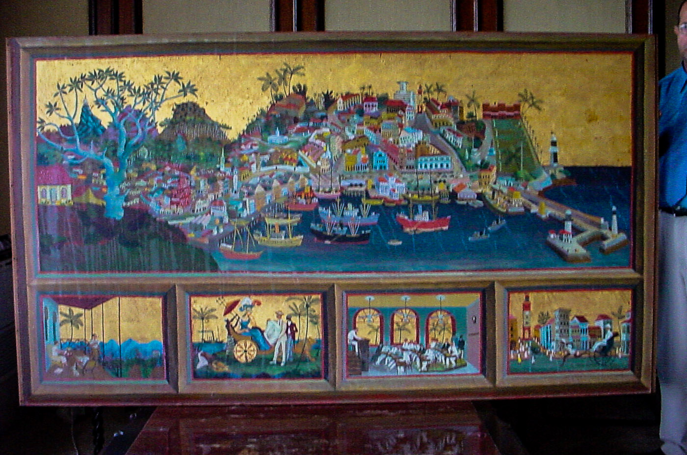 The mural after being removed, held by Michael Anthonisz